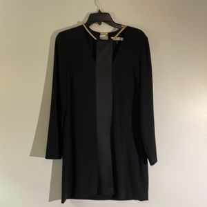 Black long sleeve Halston tuxedo style dress with gold necklace hardware